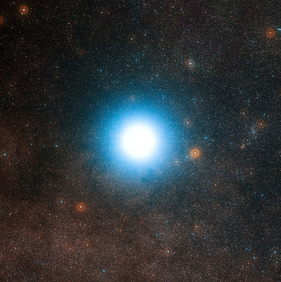 The bright star Alpha Centauri and its surroundings