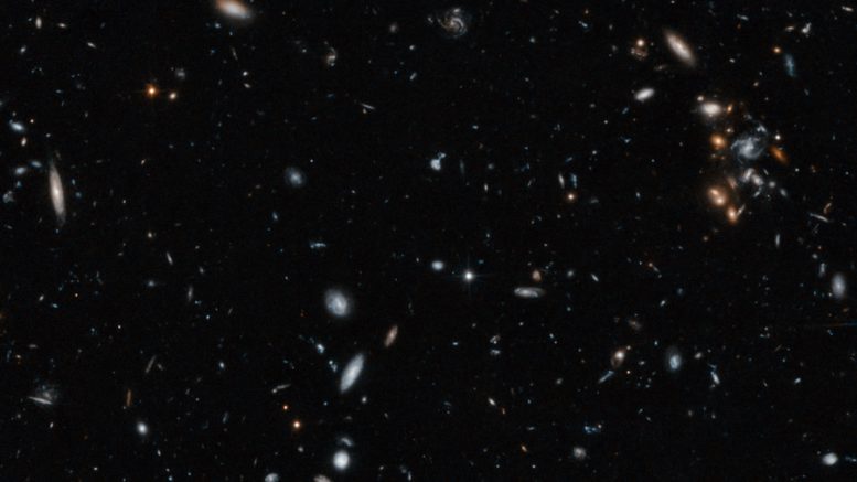 An image of a galaxy cluster taken by the NASA/ESA Hubble Space Telescope